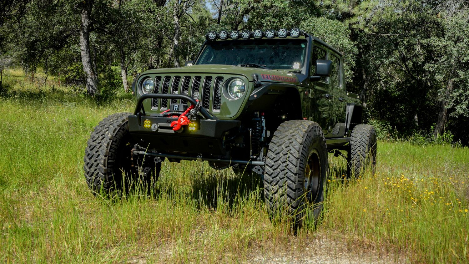 2023 Jeep Gladiator Rubicon, front three-quarter, off-road